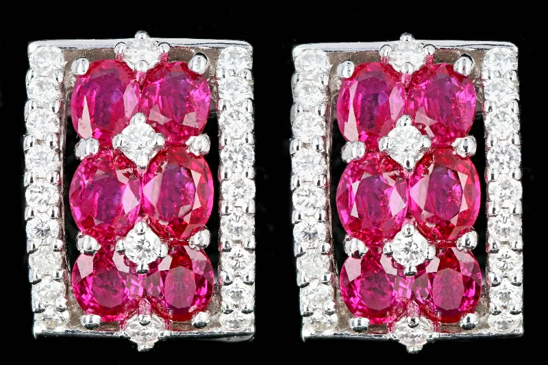 Modern Gregg Ruth 18K White Gold 2.41 Carats Oval Ruby and .58 Carat Total Weight Round Diamond Earrings